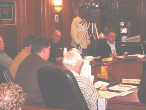 County Commissioners engage in heated discussion about failure to reach agreement on Monitor tax sharing.