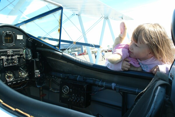 Five year old Jade Rhyan and her bunny check out Dave Dacy's Super Stearman