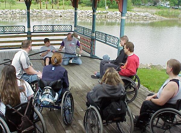 Michigan Sports Unlimited members receive instructions before getting on the water.