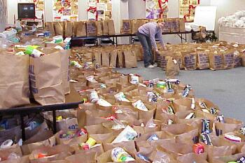 Jamie Porsch organizes bags ready for distribution