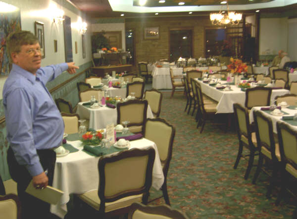 <b>Dave Pentkowski, Bay City native and St. Joseph High graduate, shows off the dining room at BPOElks Lodge 88, fourth floor in the LaPorte Building at 306 Fifth Avenue </b>