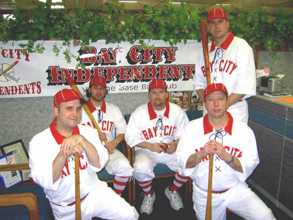 First American Title Co. hosts a pep session for the new Bay City vintage baseball team, including, from left, captain Jayme Johnson, Lloyd Fuller, Dan Decuf, Dennis Dinauer and Jeff Dinauer.