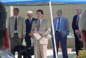 County Executive Tom Hickner lauds 30 years of service by the Bay Metro Transit Authority as, from left, District Judge Craig Alston, BMT General Manager Mike Stoner, BMT Board Chair Bob Redmond and State Sen. James Barcia await their turns to talk.