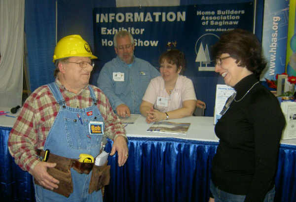 Bob the Builder, played by Tony Bosco, of Bay City, left, talks with Home Bob the Builder, played by Tony Bosco, of Bay City, left, talks with Home