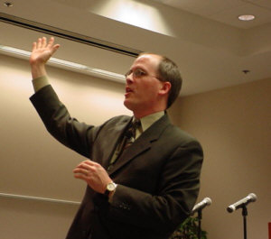 Paul Ballew charms the audience with his presentation on GM at the Tri County Economics Club.