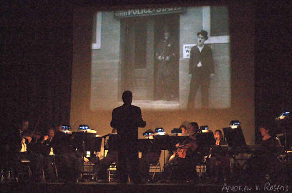 The Bijou Orchestra ended their two-hour show with a live musical performance to a showing of the Charlie Chaplin silent film, Easy Street. (Photo: Andy Rogers)