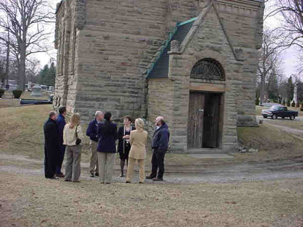 ARC Chairman Duane Anderson meets with committee at site of Elm Lawn chapel, background
