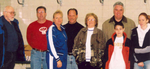 Bay City Elks 2005 Hoop Shoot Organizers (L/R) Elks' Exalted Ruler Jack McDaniels, Hoop Shoot Chairman John Sauve, Jean-Ann & Jerry DeShano, LaVona Styn, Ray Poirer & Son and Laura Sauve.