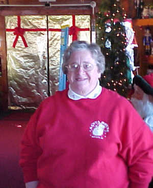 Mary Ida Doan exudes the spirit of Christmas in Bay City's fabulous Santa House, opening Saturday at 6 p.m.