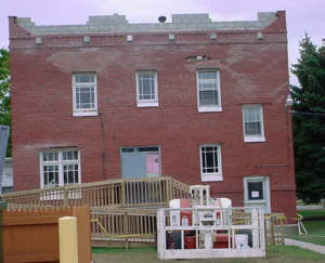 Tuckpointing the fine brickwork of the rear of the St. Mary Convent is in progress as part of a $250,000 renovation being conducted by a private fund-raising firm, the Ramona Group.