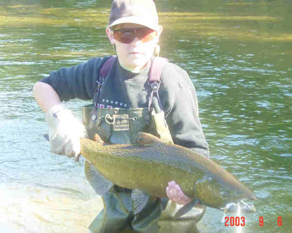 <b>Looks Like A Pro - </b>Tanner Layle shows off this huge Chinook Salmon that he and his dad (Brady Layle) landed on the Pere Marquette River in early September
