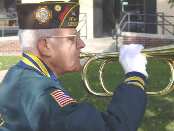 Jerry Wujkowski plays an inspiring rendition of 'Taps' during November 11, 2004 Vet's Day celebration